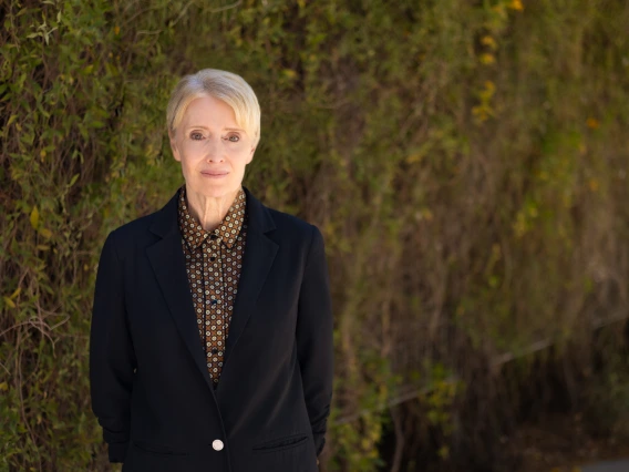 A photo of Patricia Thompson, PhD, outdoors on the campus of the University of Arizona