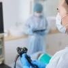 doctor views colonoscopy screen